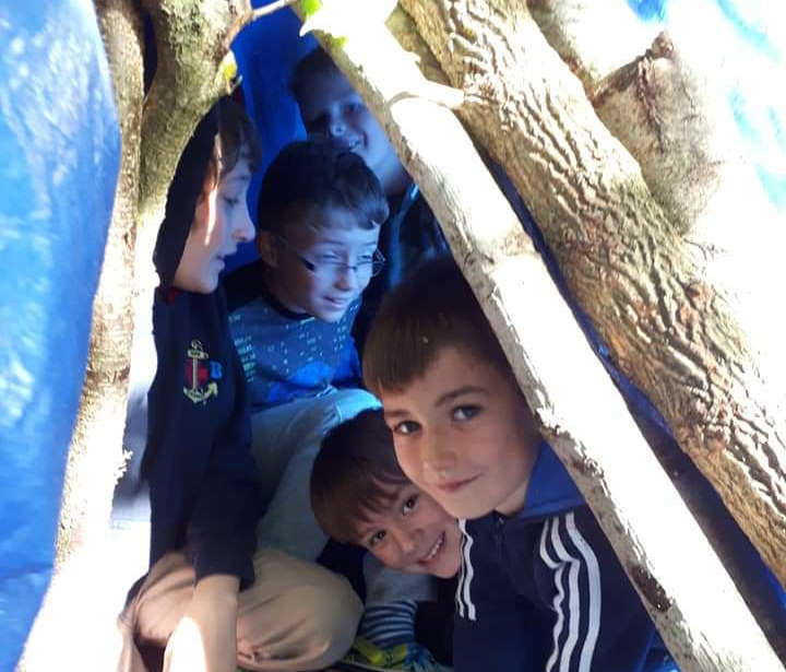 5th Gloucester Juniors after building a den on camp
